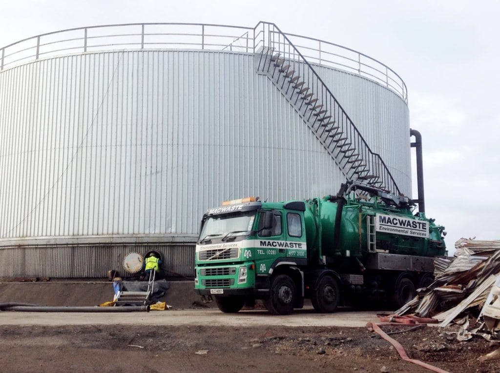 MacWaste vacuum tanker decommissioning a storage tank on an industrial site